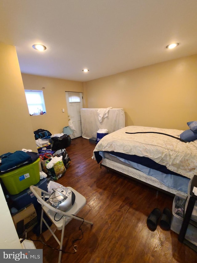 bedroom featuring dark wood-type flooring