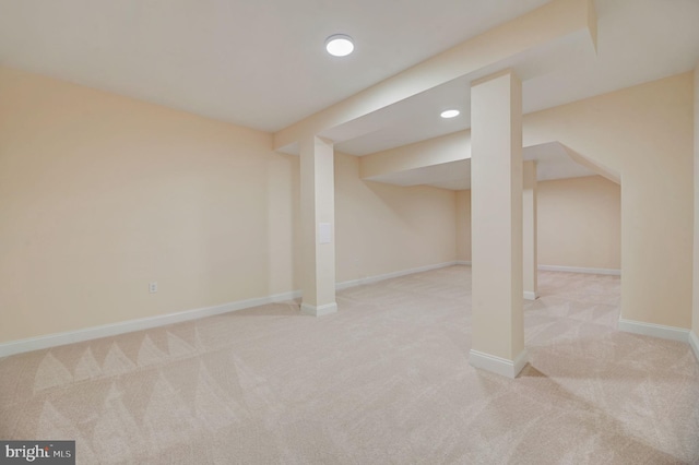 basement with light carpet