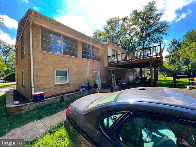 rear view of house with a deck