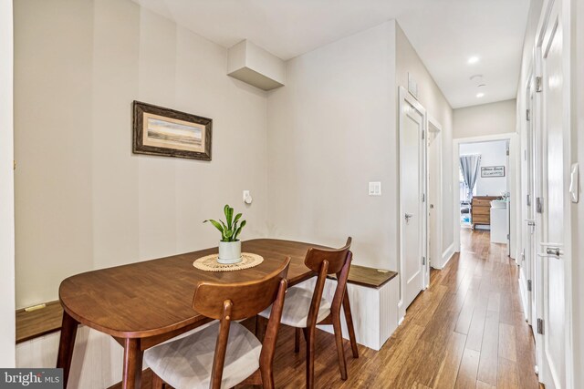 dining area featuring light wood-type flooring