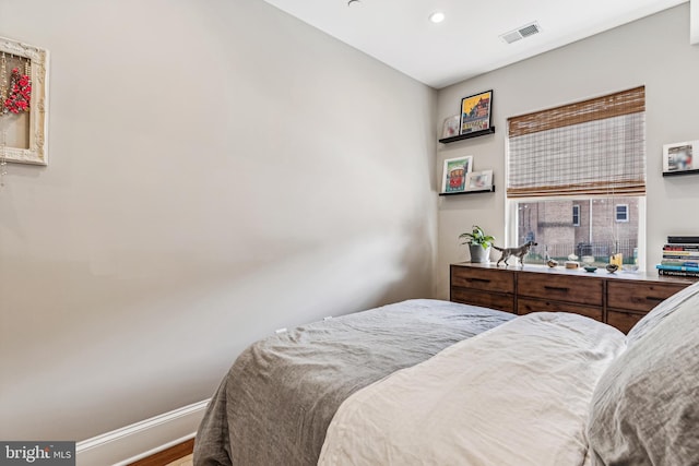 bedroom featuring hardwood / wood-style floors