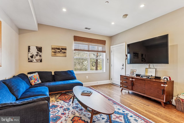 living room featuring light wood-type flooring