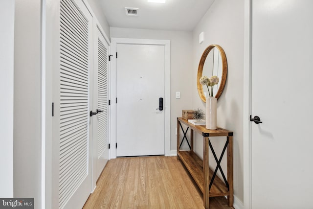 doorway to outside featuring light hardwood / wood-style floors