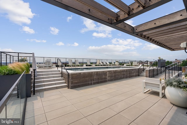 view of patio featuring a pergola and a community pool