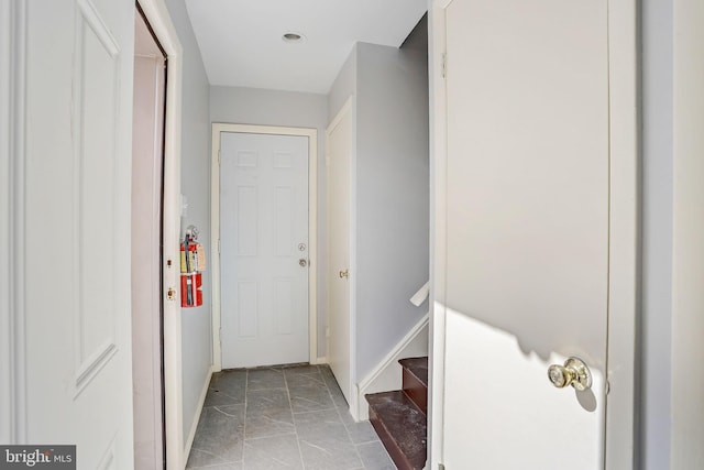 corridor with light tile flooring