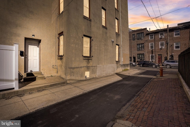 view of property exterior at dusk