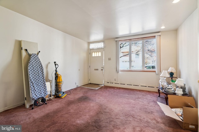 interior space featuring a baseboard heating unit