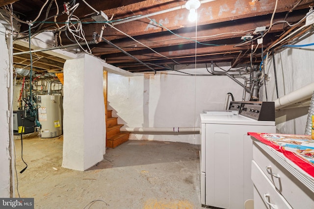 basement with gas water heater and independent washer and dryer