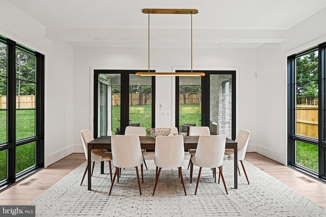 dining area with light wood-type flooring