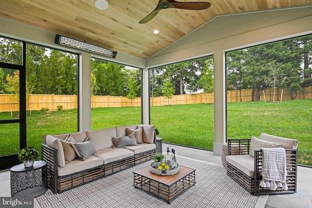 sunroom with wood ceiling, vaulted ceiling, and ceiling fan