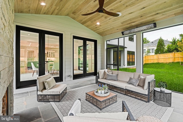 view of patio with outdoor lounge area, french doors, and ceiling fan