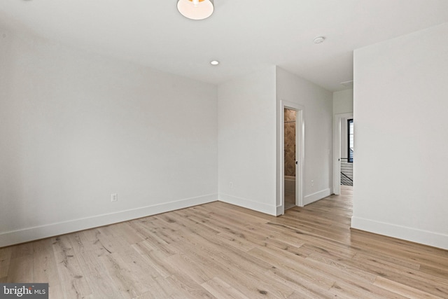 empty room with light wood-type flooring