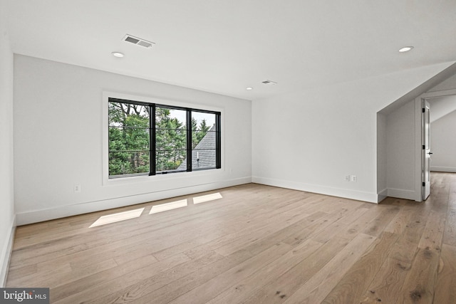 unfurnished room featuring light hardwood / wood-style flooring