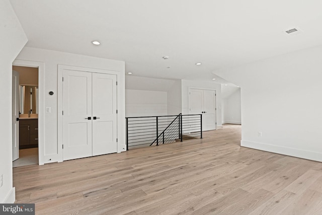 bonus room featuring light hardwood / wood-style floors