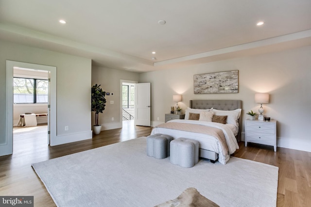 bedroom featuring hardwood / wood-style flooring