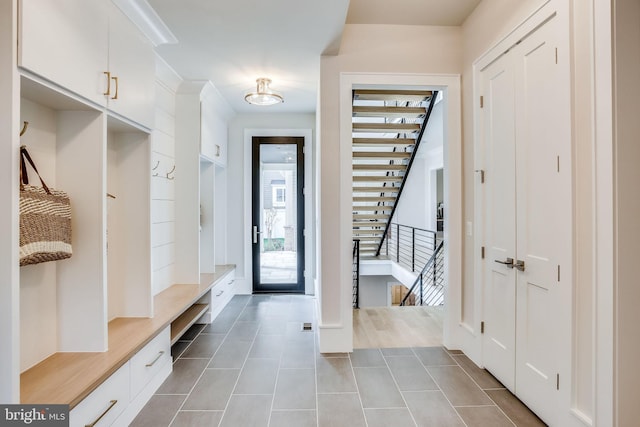 mudroom featuring light tile patterned floors