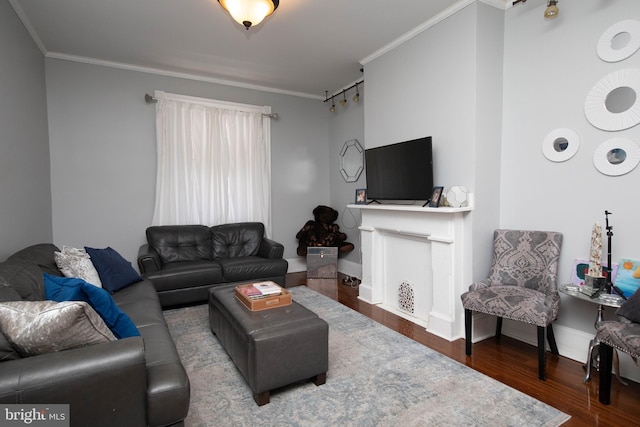 living room featuring ornamental molding and dark wood-type flooring