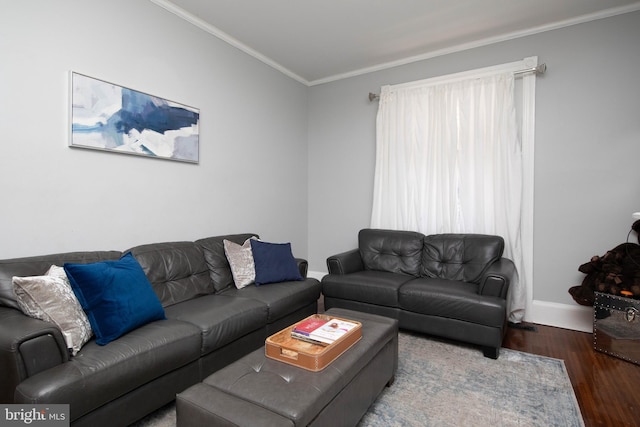 living room with crown molding and hardwood / wood-style floors