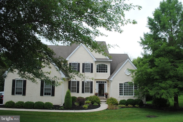 colonial house with a front yard