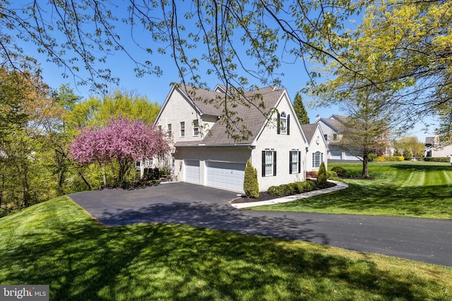 view of home's exterior featuring a yard