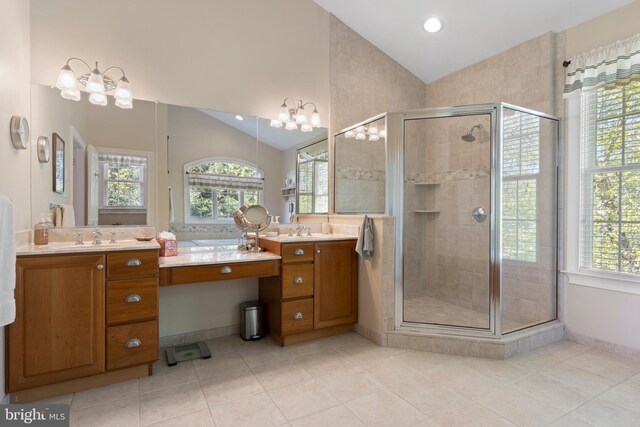 bathroom with walk in shower, a healthy amount of sunlight, lofted ceiling, and a notable chandelier