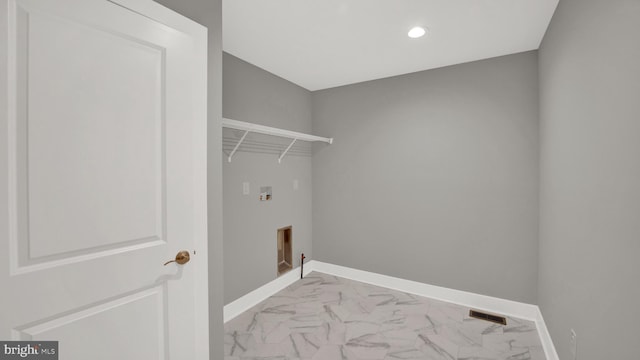 clothes washing area featuring hookup for a gas dryer and hookup for a washing machine