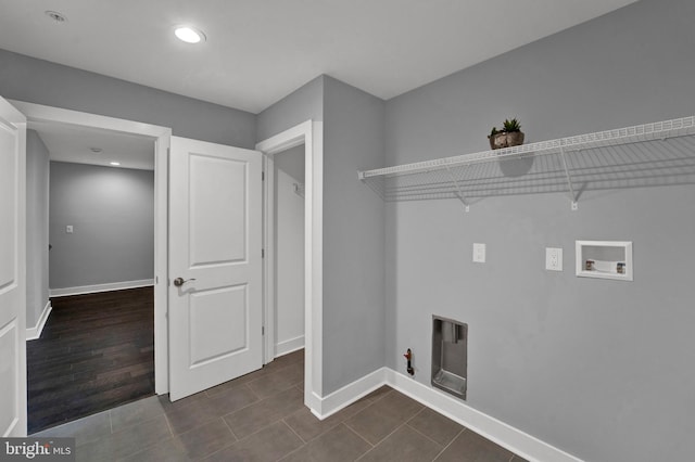 laundry area with dark hardwood / wood-style floors, hookup for a washing machine, and hookup for a gas dryer