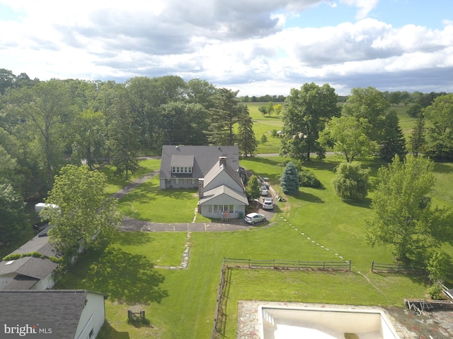 birds eye view of property featuring a rural view