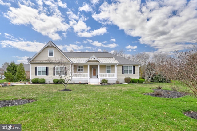 view of front of home with a front yard and a porch