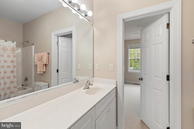 bathroom with vanity and shower / bath combo with shower curtain