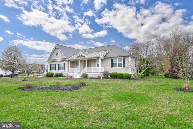 ranch-style home featuring a porch and a front yard