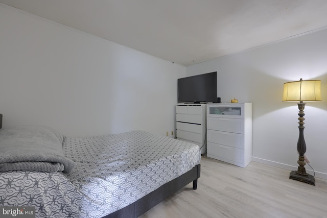 bedroom featuring light hardwood / wood-style floors