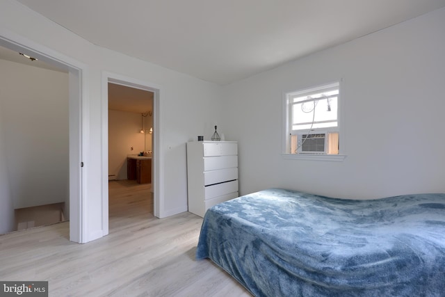 bedroom featuring light wood-type flooring