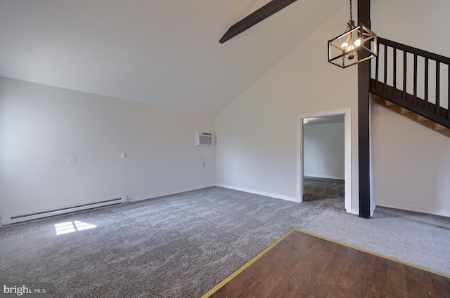 unfurnished living room with dark carpet, a chandelier, a baseboard heating unit, and a wall mounted AC