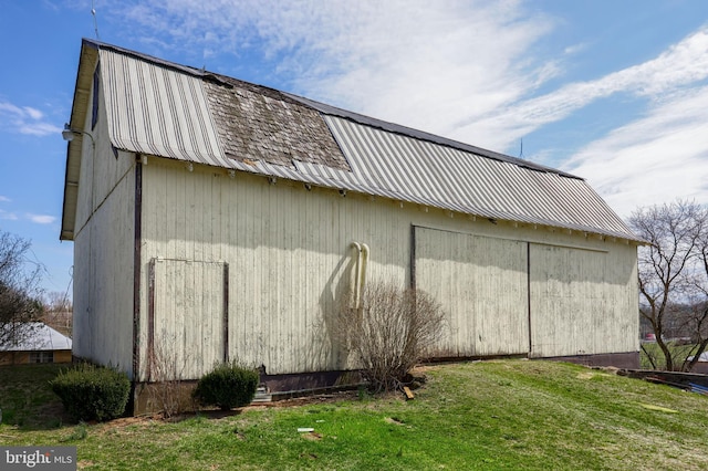 view of home's exterior featuring a lawn