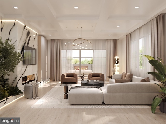 living room featuring beam ceiling, light hardwood / wood-style floors, a wealth of natural light, and coffered ceiling