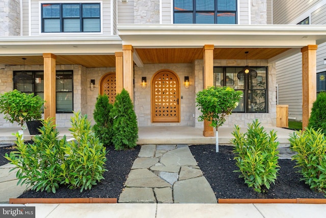 entrance to property with covered porch