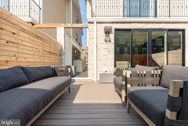 deck featuring an outdoor living space