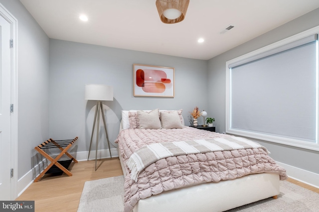 bedroom with light hardwood / wood-style flooring