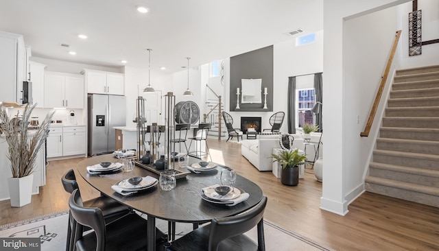 dining area with light wood-type flooring