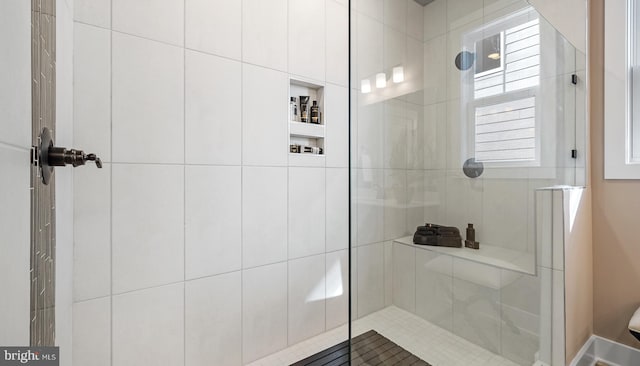 bathroom featuring walk in shower