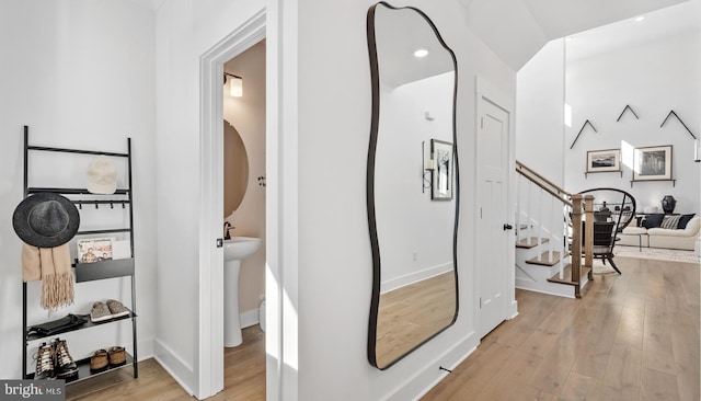 hallway featuring light hardwood / wood-style flooring