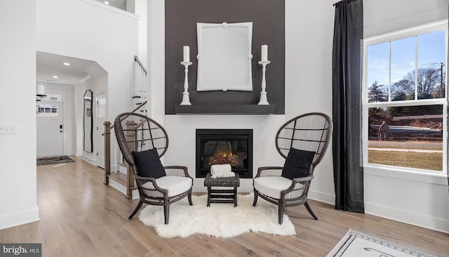 sitting room featuring light wood-type flooring