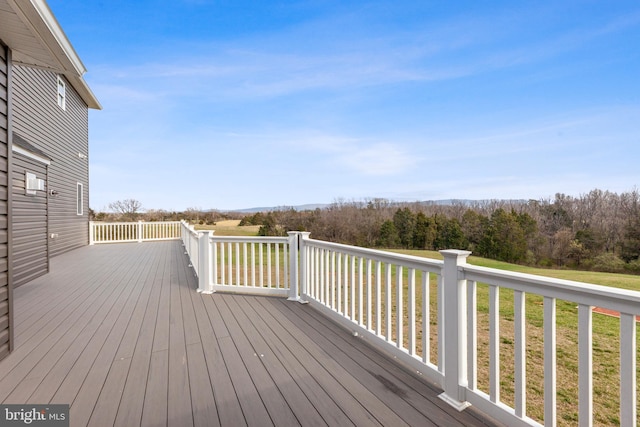 deck featuring a yard