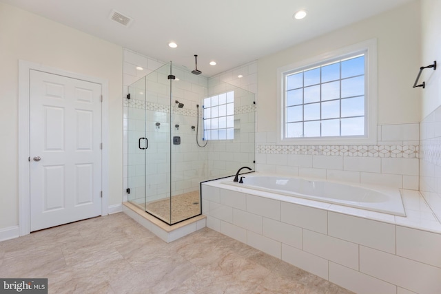 bathroom with tile floors and plus walk in shower