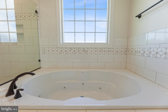 bathroom with a washtub