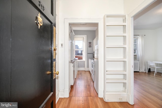 hallway featuring light wood-type flooring