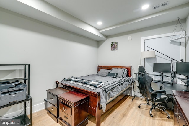 bedroom with light hardwood / wood-style floors