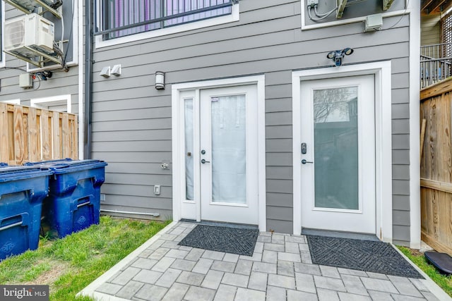 doorway to property featuring a patio