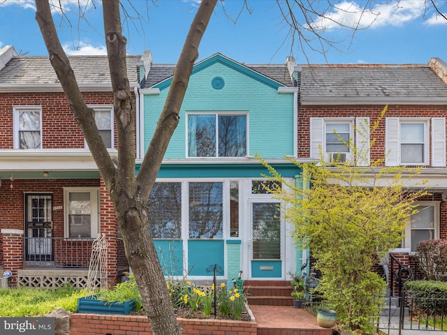 multi unit property featuring a porch